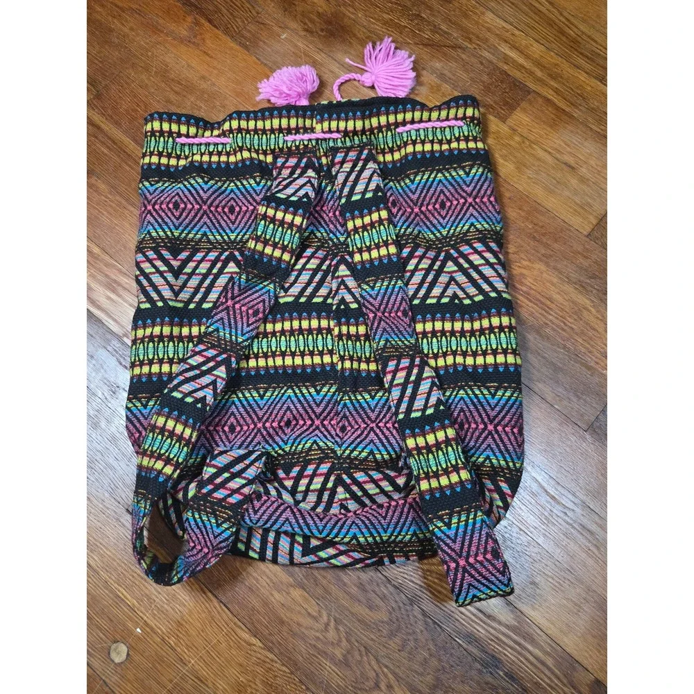 Urban Expressions Multi Geometric Woven Drawstring Backpack Pom Poms UB171155